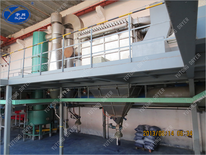 Foaming agent flash dryer